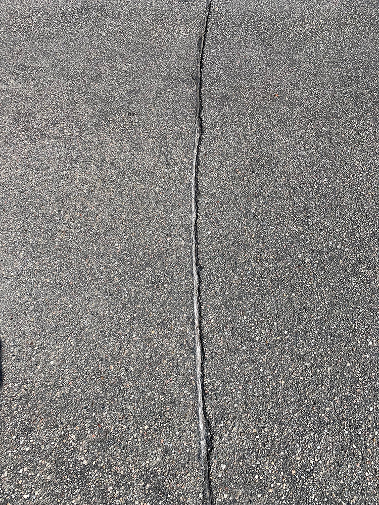 Routering of concrete and asphalt upclose